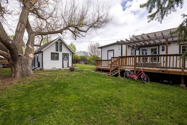 view of yard featuring a pergola and a deck