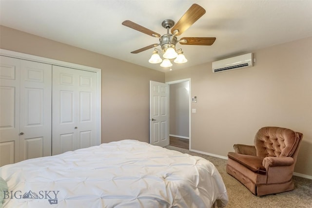 carpeted bedroom featuring ceiling fan, a wall unit AC, and a closet