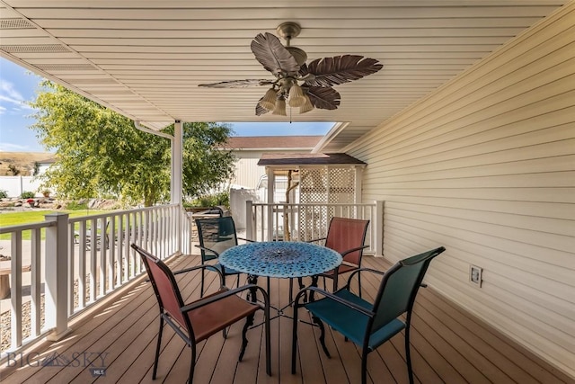 wooden deck with ceiling fan