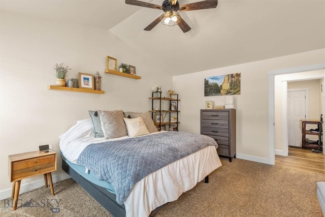 bedroom with carpet floors, vaulted ceiling, and ceiling fan