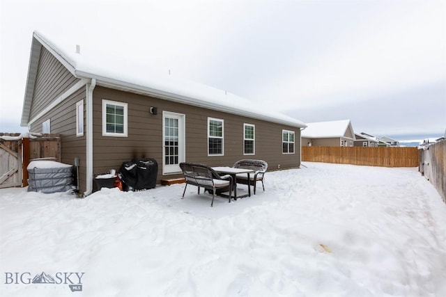 view of snow covered house