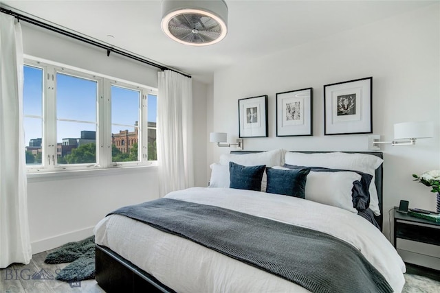 bedroom featuring hardwood / wood-style flooring