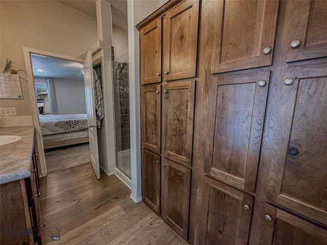 interior space with hardwood / wood-style floors and sink