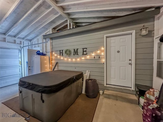 interior space featuring wood walls