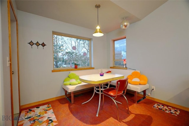 view of carpeted dining area