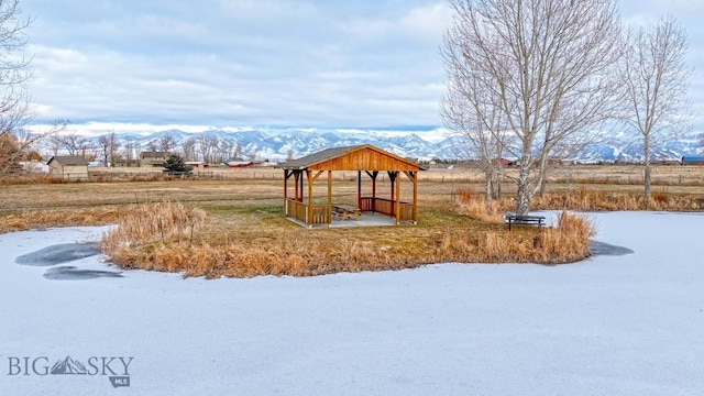 view of yard featuring a mountain view and a gazebo