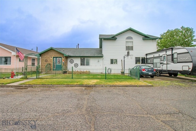 view of front of property with a front lawn