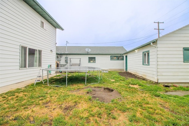 view of yard featuring a trampoline