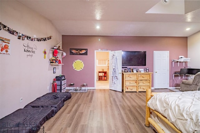 bedroom featuring wood-type flooring