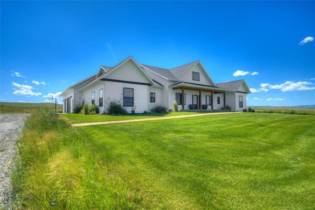 view of front of home with a front yard