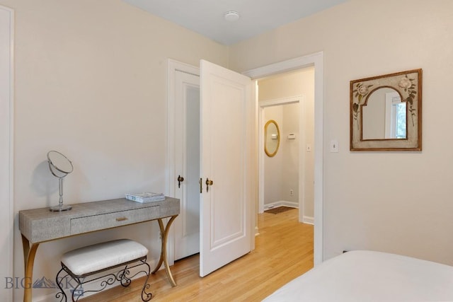 bedroom with wood-type flooring