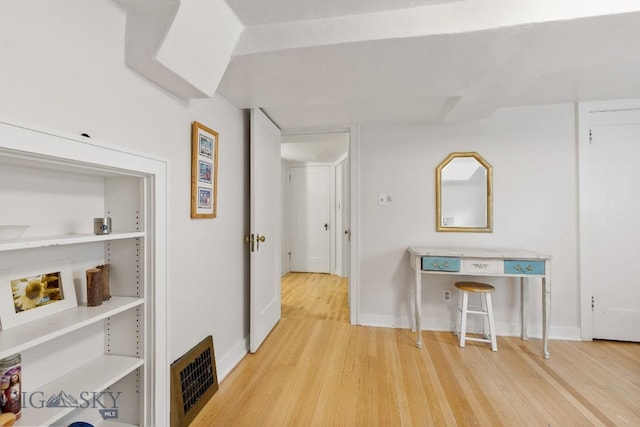 hall featuring wood-type flooring