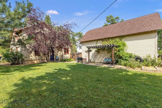 view of yard with a pergola