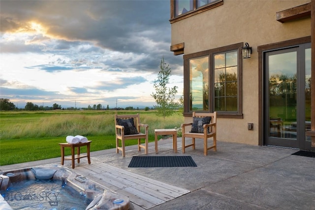 view of patio featuring a deck and a rural view