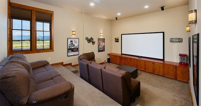 cinema featuring recessed lighting, baseboards, and light colored carpet