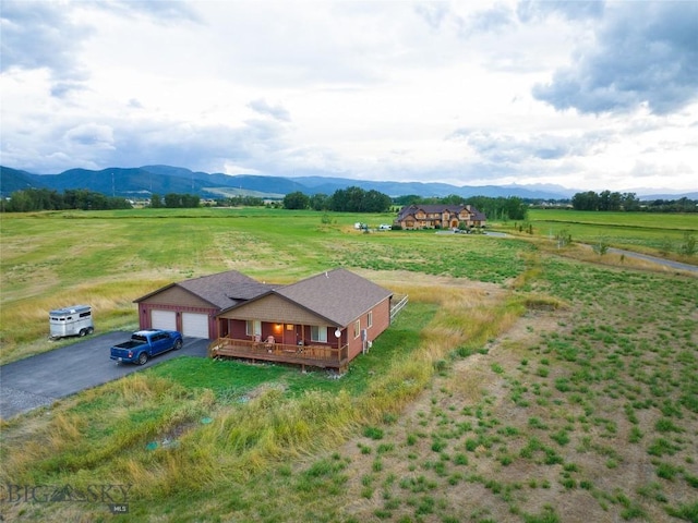 aerial view featuring a rural view and a mountain view