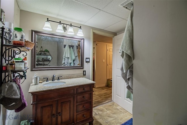 bathroom featuring vanity and a paneled ceiling