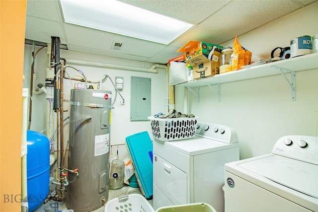 washroom with electric panel, separate washer and dryer, and water heater