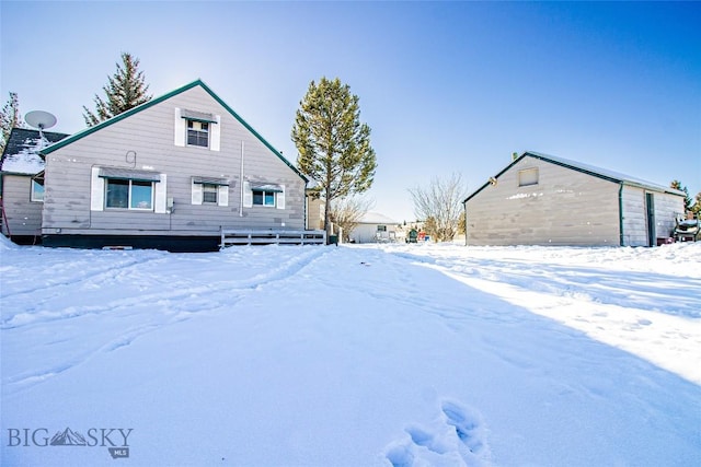 view of snow covered property