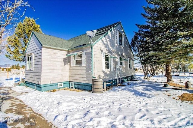 view of snow covered property