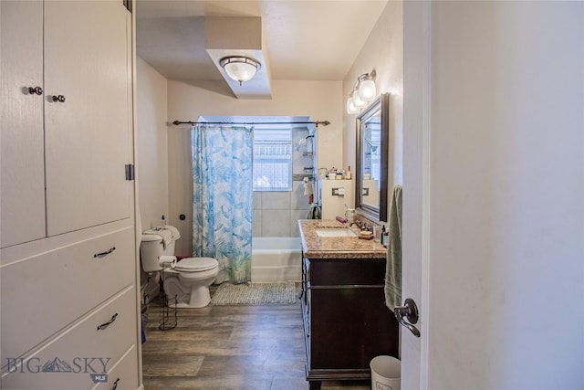 full bathroom featuring shower / bath combination with curtain, vanity, toilet, and hardwood / wood-style flooring