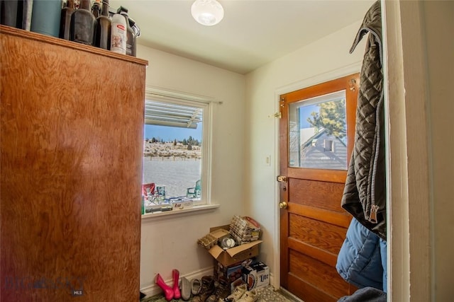 doorway featuring a water view