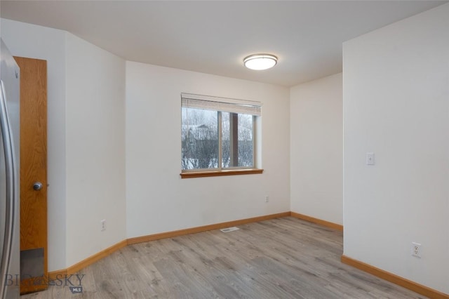 1121 Buckrake Ave, Bozeman, MT 59718 - empty room featuring wood finished floors and baseboards