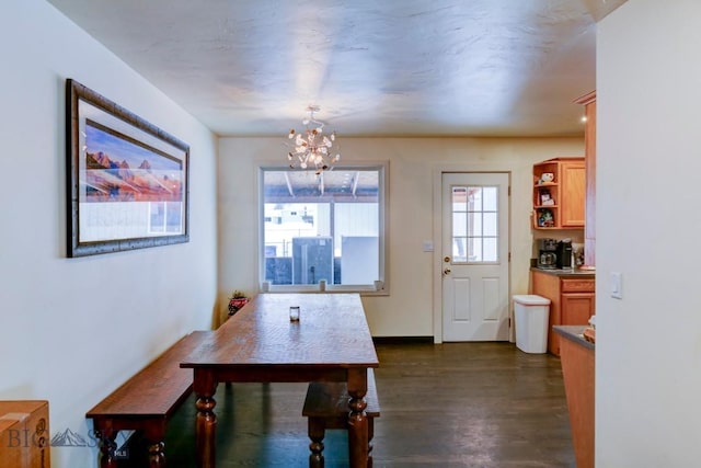 dining area featuring a chandelier