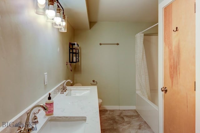 full bathroom featuring shower / tub combo, vanity, and toilet