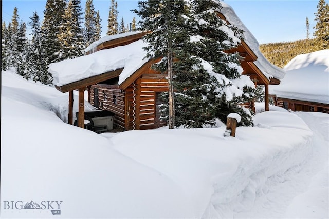 view of snow covered property