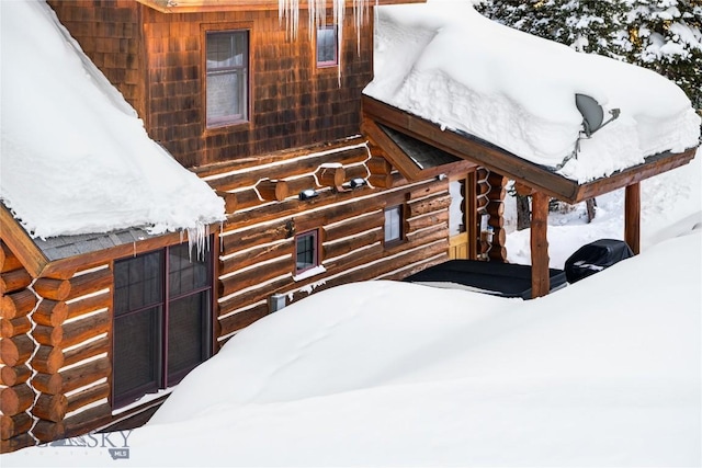 exterior space with log walls