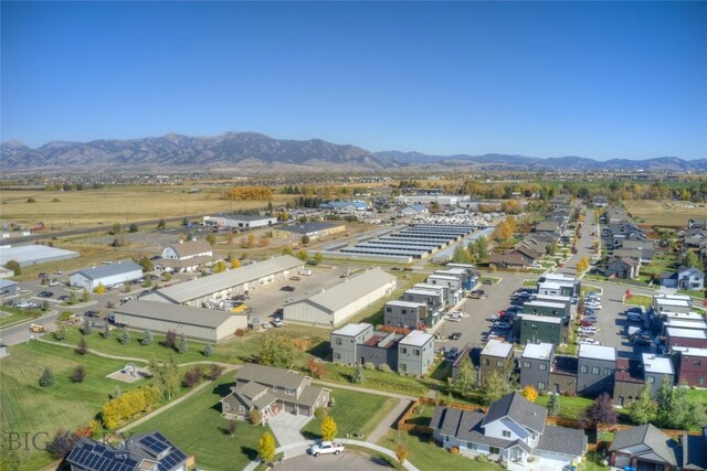 drone / aerial view featuring a mountain view