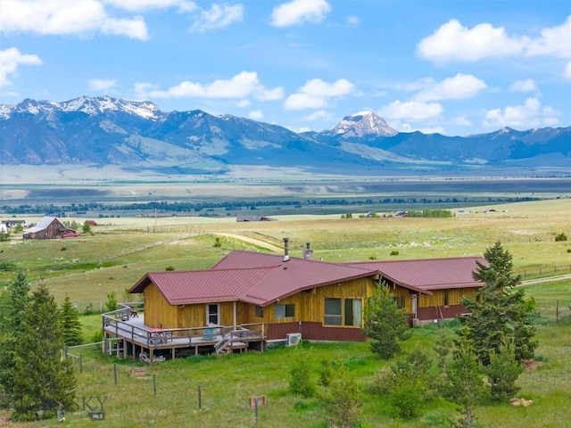 view of mountain feature with a rural view