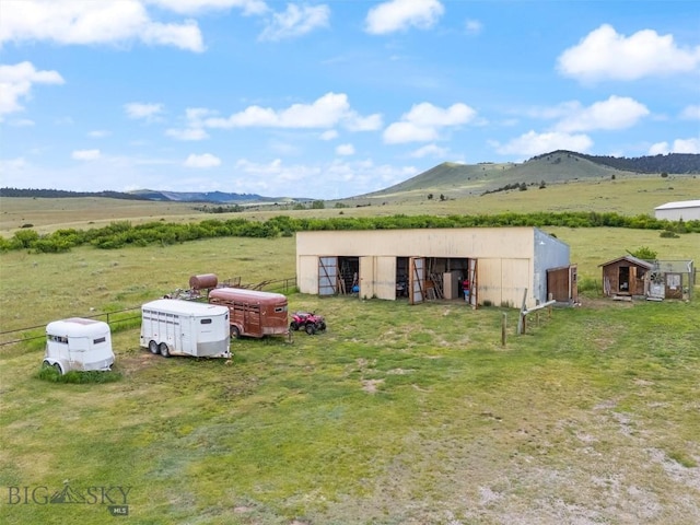 exterior space featuring a mountain view and a rural view