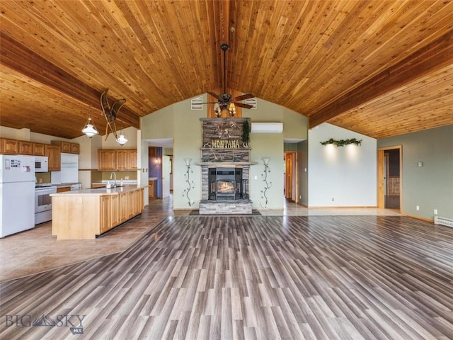 kitchen with white appliances, wooden ceiling, a center island with sink, hardwood / wood-style flooring, and decorative light fixtures