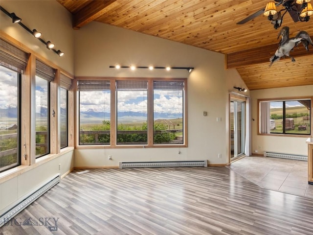 interior space with light hardwood / wood-style flooring and a baseboard radiator