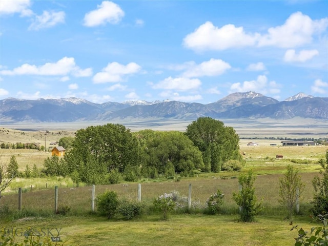 view of mountain feature with a rural view