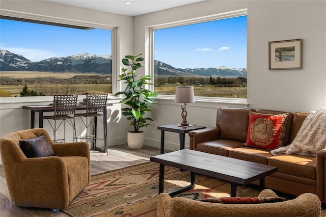 420 Sage Ave Unit B, Ennis, MT 59729 - interior space featuring baseboards, wood finished floors, recessed lighting, and a mountain view