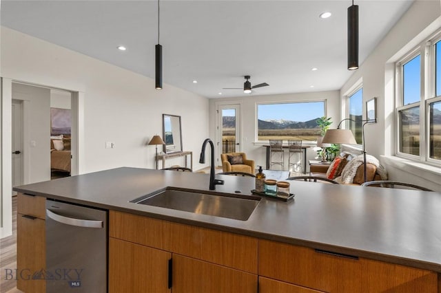 420 Sage Ave Unit B, Ennis, MT 59729 - kitchen featuring dishwasher, a healthy amount of sunlight, open floor plan, and a sink