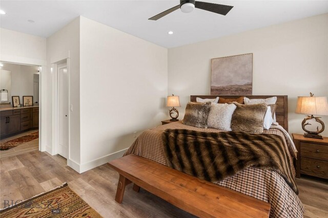 420 Sage Ave Unit B, Ennis, MT 59729 - bedroom featuring light wood-style flooring, baseboards, recessed lighting, and connected bathroom