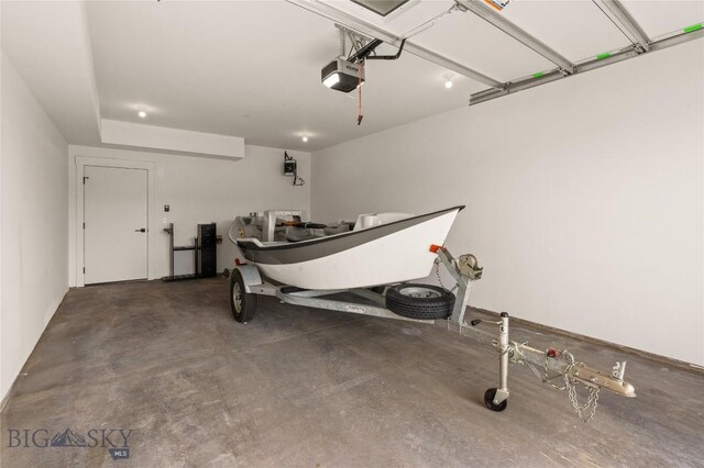 420 Sage Ave Unit B, Ennis, MT 59729 - garage featuring a garage door opener