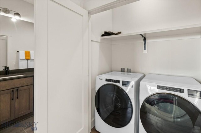 420 Sage Ave Unit B, Ennis, MT 59729 - washroom with a sink, laundry area, and independent washer and dryer