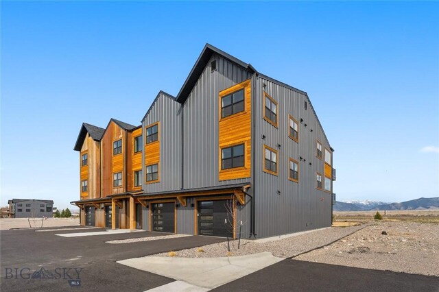 420 Sage Ave Unit B, Ennis, MT 59729 - view of property with an attached garage and driveway