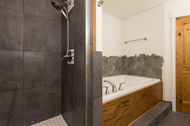 bathroom with tile patterned flooring and plus walk in shower