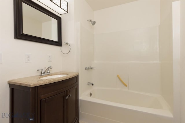 bathroom featuring vanity and shower / bath combination