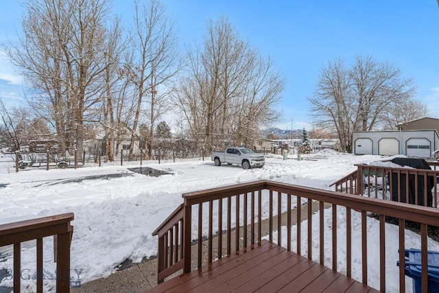 view of snow covered deck