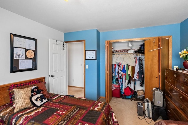 bedroom featuring carpet and a closet