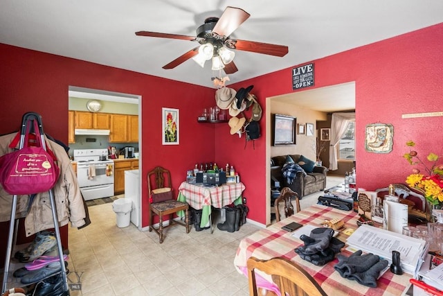 dining area with ceiling fan