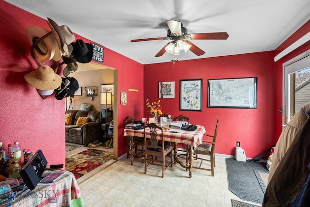 dining room with ceiling fan