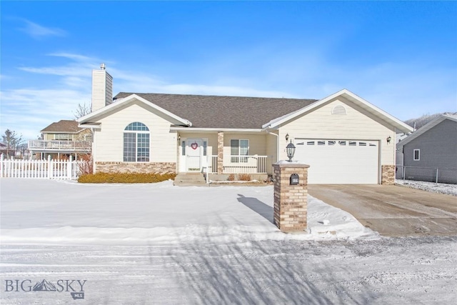 ranch-style home with a garage